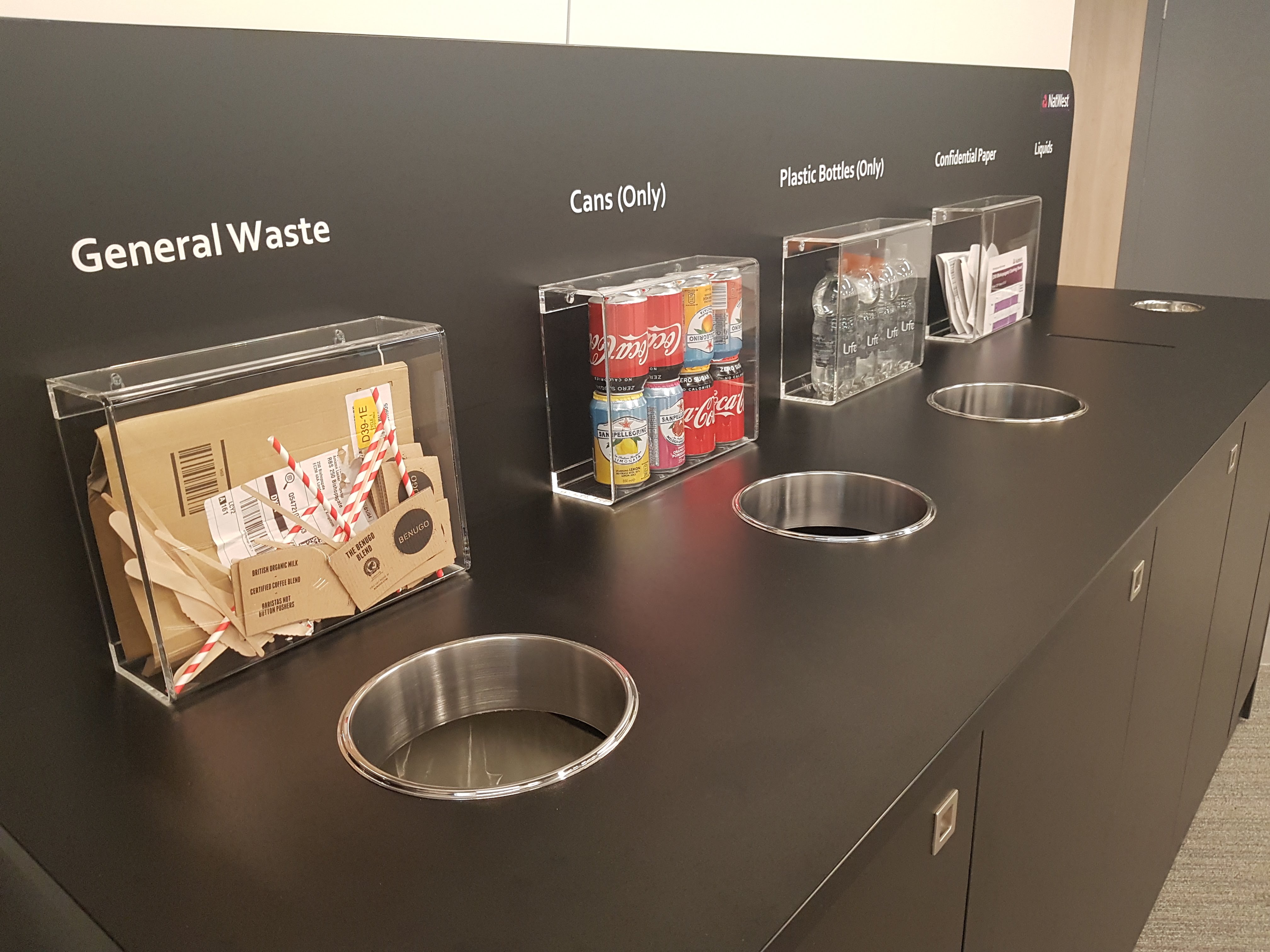 easy to use centralised recycling bin station for offices with clear signage