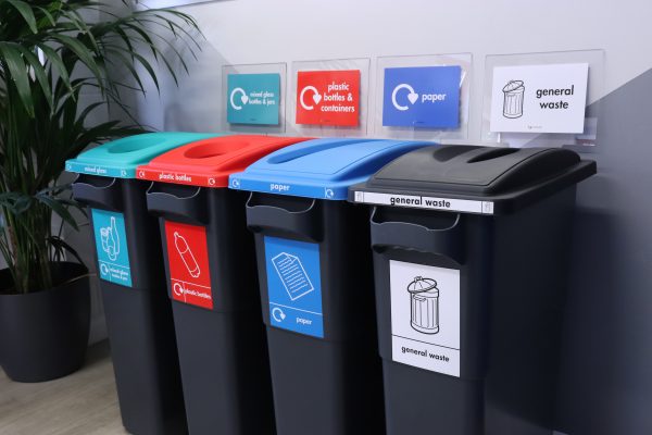 Agile plastic recycling bins with signage