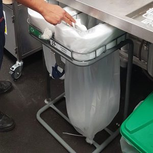 dual recycling and general waste longopac bin in use at greggs